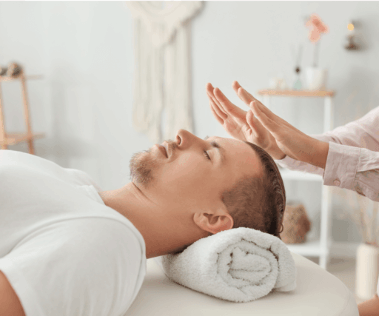 person on table getting reiki